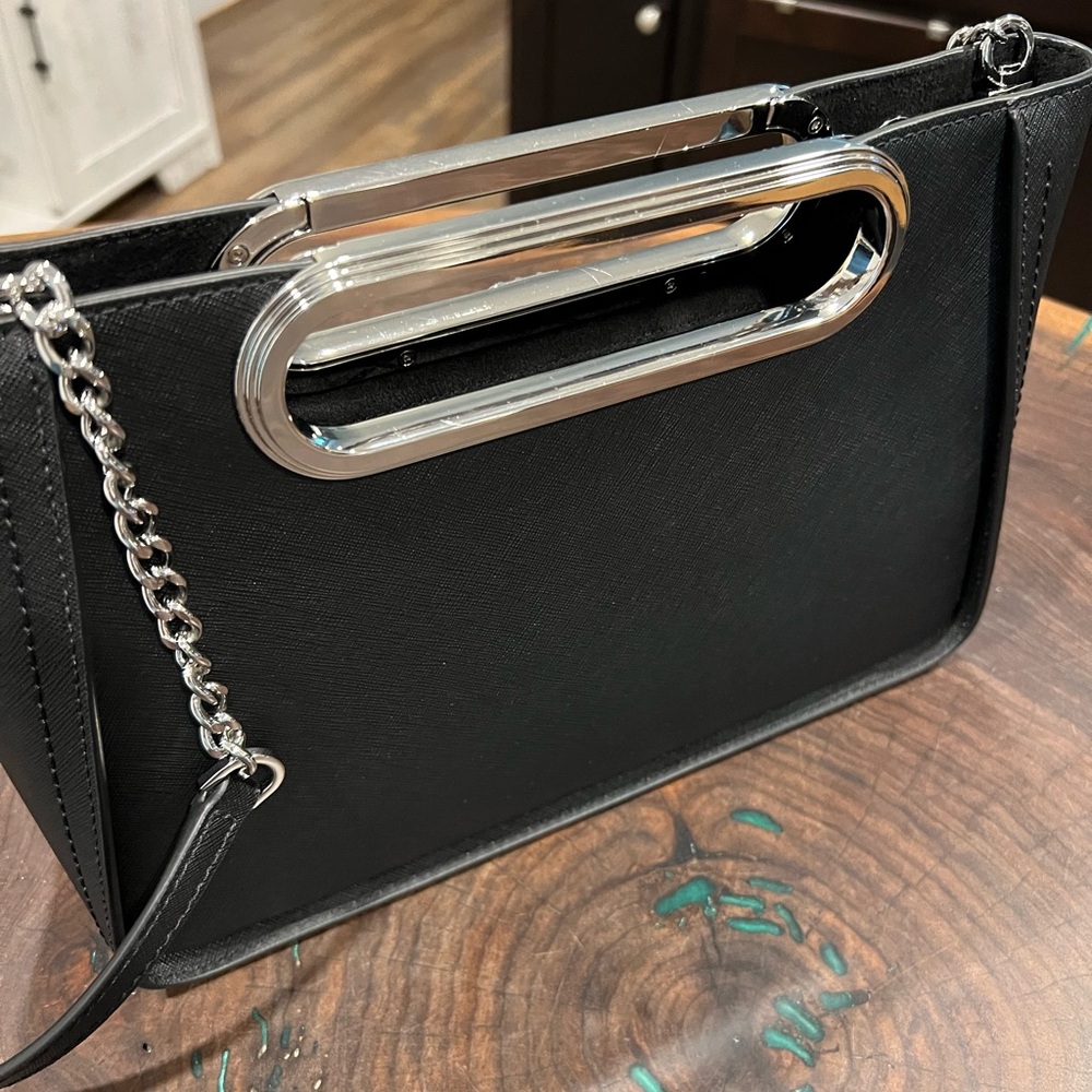 Michael Kors Elegant Black Clutch/Handbag with Silver Accents & shoulder strap